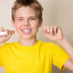 WHAT SHOULD I USE TO CLEAN BETWEEN MY TEETH?