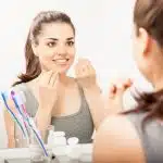 WHAT IS THE BEST TIME TO CLEAN BETWEEN YOUR TEETH— BEFORE OR AFTER BRUSHING?